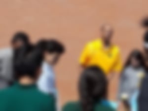 Mr Hines holding class in the courtyard